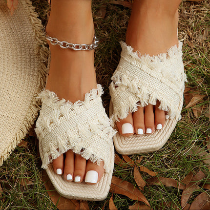 Vada Woven Tassel Flat Slippers