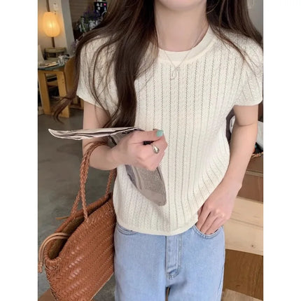 A hollowed-out round-neck ice silk knitted T-shirt for women in summer, a loose short-sleeved and slimming top, is thin