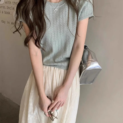 A hollowed-out round-neck ice silk knitted T-shirt for women in summer, a loose short-sleeved and slimming top, is thin